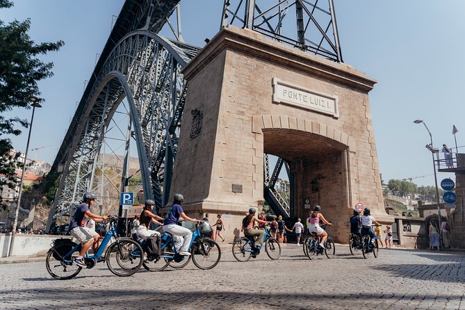 3-Hour Porto Highlights on a Electric Bike Guided Tour - Meeting point, helmets, and how the ride stays under control