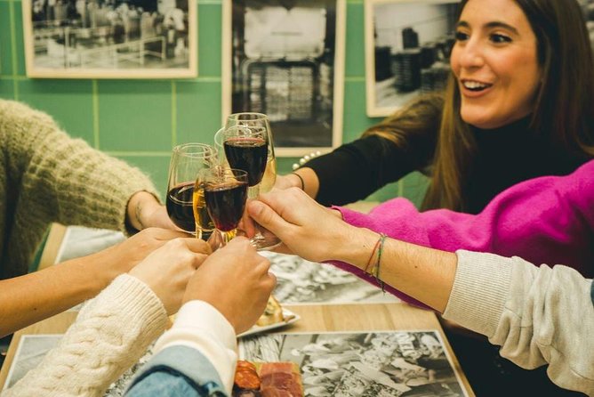 Authentic Porto Food Tour & Market Experience - Stop 2: Market tour tasting with cured meat, cheese, cans, and vinho verde
