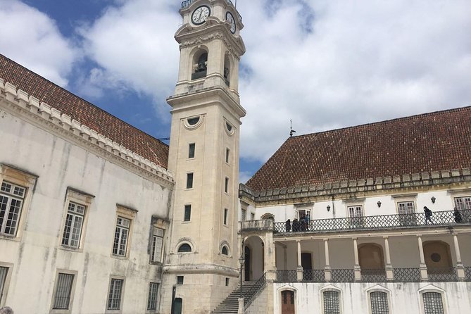 Aveiro and Coimbra Small Group Tour with Moliceiro Boat Cruise - Manga garden/clauster and the church stop: the old-town edges that round it out