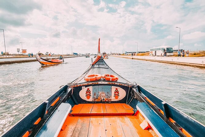 Aveiro Walking and Boat Tour Ovos moles and Colorful Ribbons - Entering the Bairro da Beira-mar Mindset: Salt Pans, Trade, and Daily Life