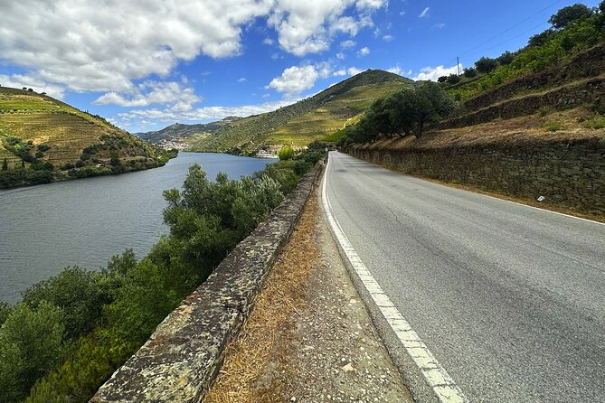 Douro Valley Full Day Tour with River Cruise and Wine Tastings - Pinhão and the Rabelo boat: calm views, possible lack of narration