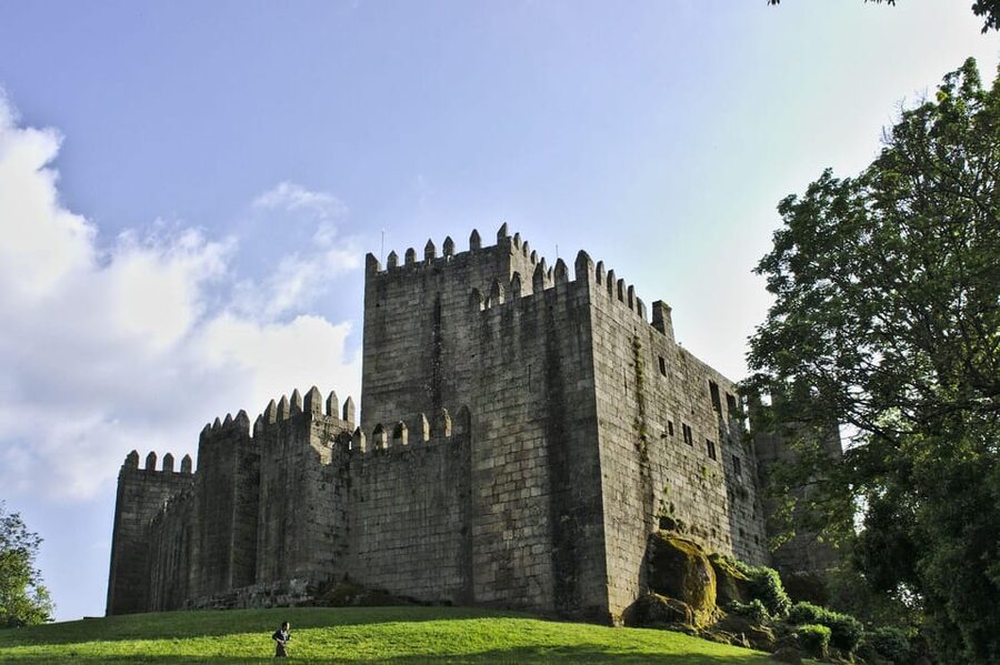 From Porto: Braga & Guimarães Day Trip with Lunch - Porto pickup and the smooth ride in a small group van