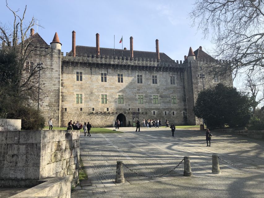From Porto: Braga & Guimarães with Lunch Small Group Tour - Lunch in the Norte: Portuguese comfort food and vinho verde