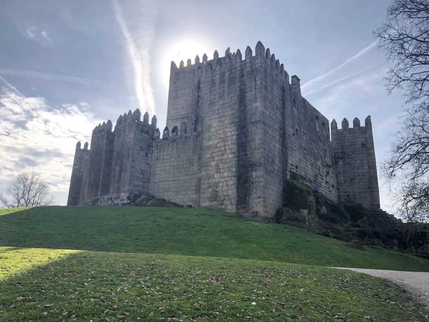 From Porto: Braga & Guimarães with Lunch Small Group Tour - Inside the Guimarães Castle: where the kingdom is tied to stone