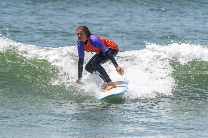 Guided surf tours from Porto city to the beach - Paramos Beach surf school: gear, showers, and that women-focused vibe