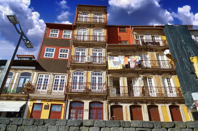 Half-day small group tour of Porto city with wine tasting - Sé Cathedral, Clérigos Tower, and São Bento tiles: your Porto orientation starter pack
