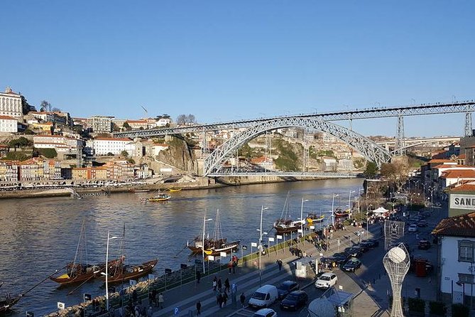 Half-day small group tour of Porto city with wine tasting - Livraria Lello, Bolhão Market, and the Clerérigos cluster: culture in quick bursts