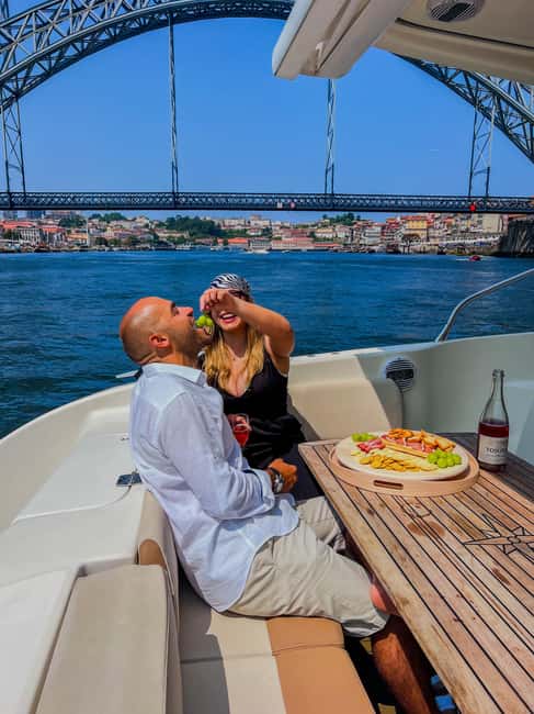 Porto: 6 Bridges Private Cruise with Local Wine and Snacks - Glide down the Douro: the Porto riverfront, with photo stops built in
