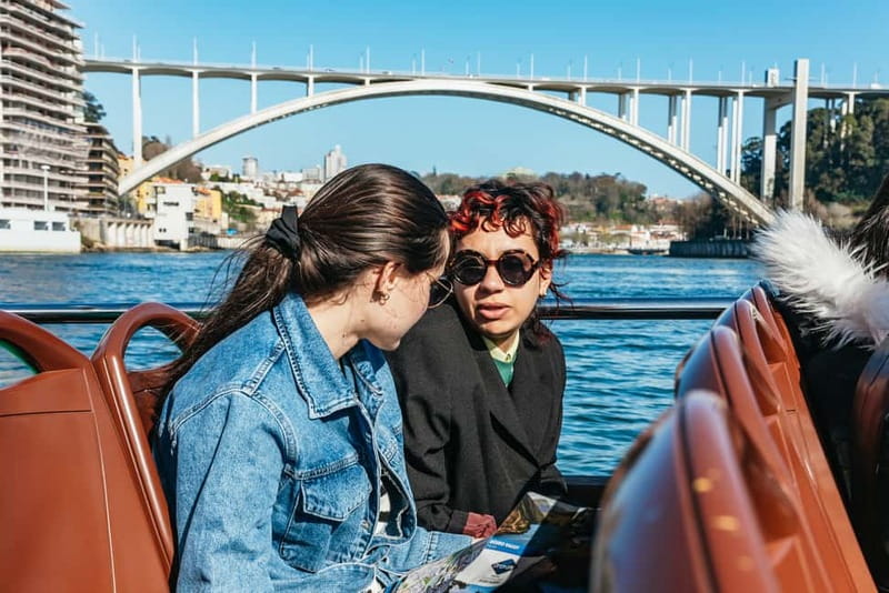 Porto: Bridges Cruise & Sunset & Port Wine Cellar Option - Getting comfortable on the boat: seats, wind, and the audio guide reality check