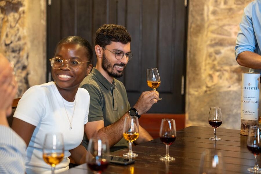 Porto City Full Day Minibus Tour, Wine Tasting & Six Brigdes - UNESCO Porto core: São Bento tiles, the Sé Cathedral break, and the Fernandina Wall views