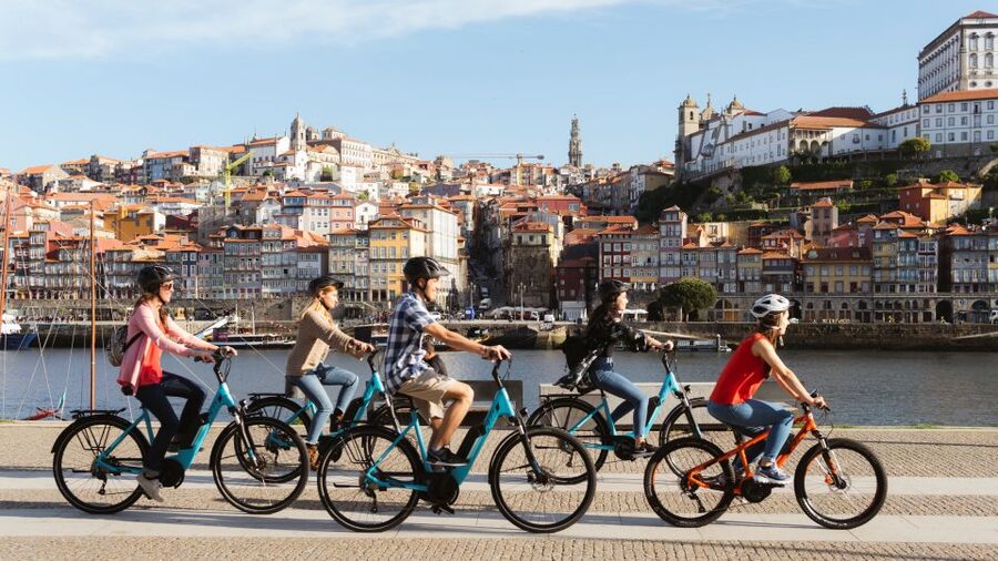 Porto: City Highlights 3-Hour Guided Electric Bike Tour - Porto Cathedral (Sé): Romanesque weight at street level