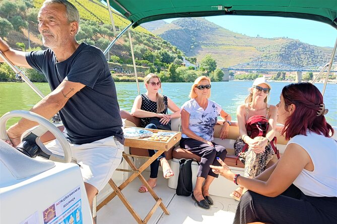 Porto: Douro Valley Private Grand Experience - Private - First Winery Stop: Vineyards, a Historic Cellar, and Olive Oil
