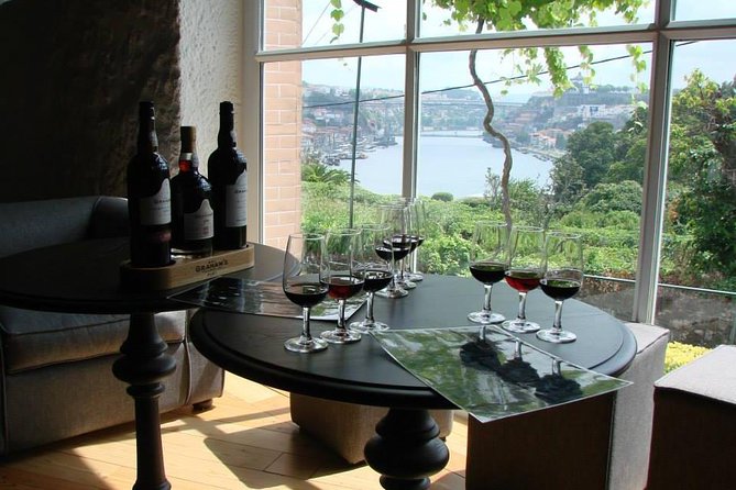 Porto Full Day City Tour Wine Tasting and Six Bridges Cruise - Historic center walking tour: medieval streets and Clérigos baroque impact