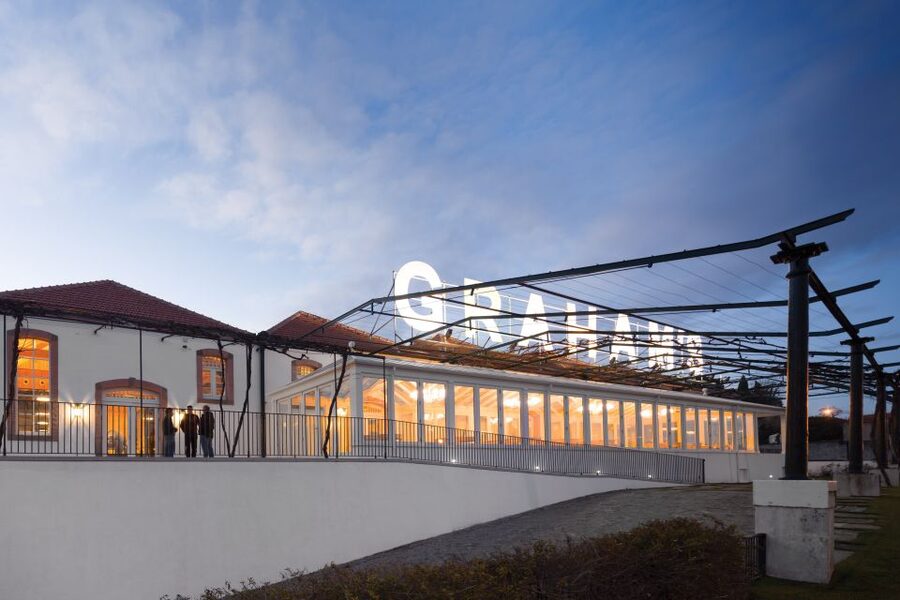 Porto: Graham's Port Lodge Tour with Premium Wine Tastings - The views over Porto and the bridge: why the terrace matters