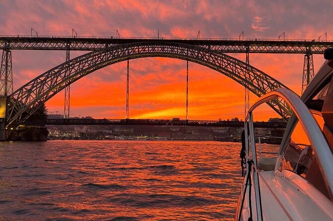 Porto: Luxury Yacht Cruise with Wine Tasting & Snacks - Snacks and charcuterie board: enough to tide you over, not always a meal