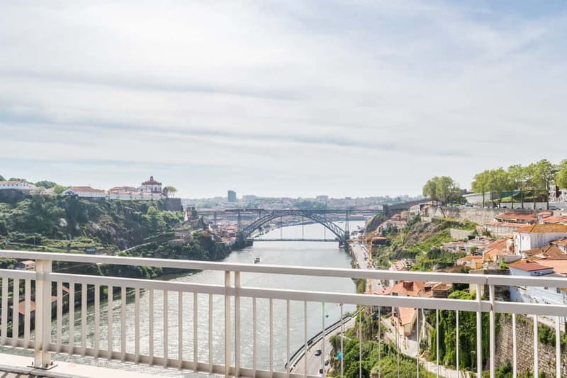 Porto: Magic Train Tour and Port Wine Cellar with Tastings - The city sights you’ll pass: Praça da Batalha to São Bento to Clerigos