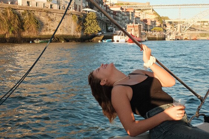 Porto Private Boat Cruise with Port Wine and Snacks - Customs-era building and cultural stops by the river
