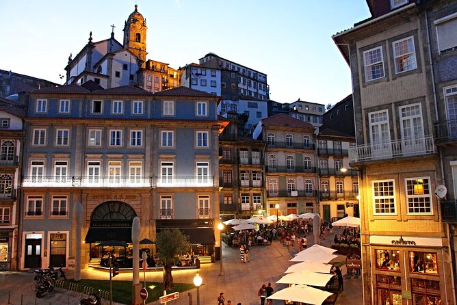 Porto Private City Tour - Ribeira Square by the Douro: river views, fountain, and a dinner-ready mood