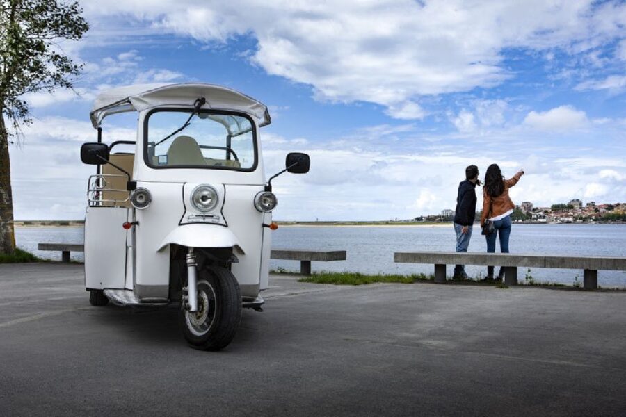 Porto: Private Sightseeing Tour by Electric Tuk Tuk - Ribeira and the Douro River: kicking off the UNESCO feeling