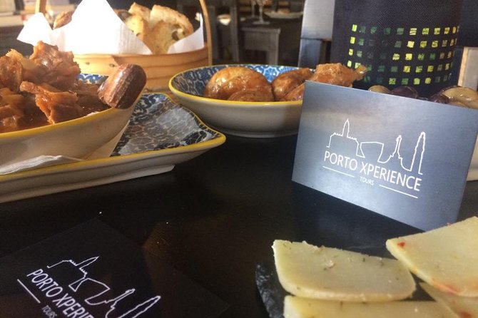Porto: Private Walking Food Tour with Tastings - First tastings: cheese, wine, and a guide to how Porto eats