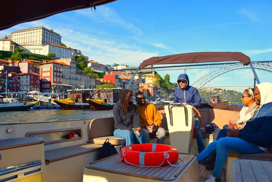 Porto: Six Bridges Douro River Cruise with Drinks - The Human Part: captains and guides (Raul, Maria, Jorge, George) bringing it to life