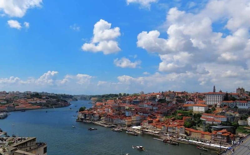 Porto: Sunset Cruise on the Douro River & Iconic Bridges - Cais da Ribeira meeting point: the pink-spot moment
