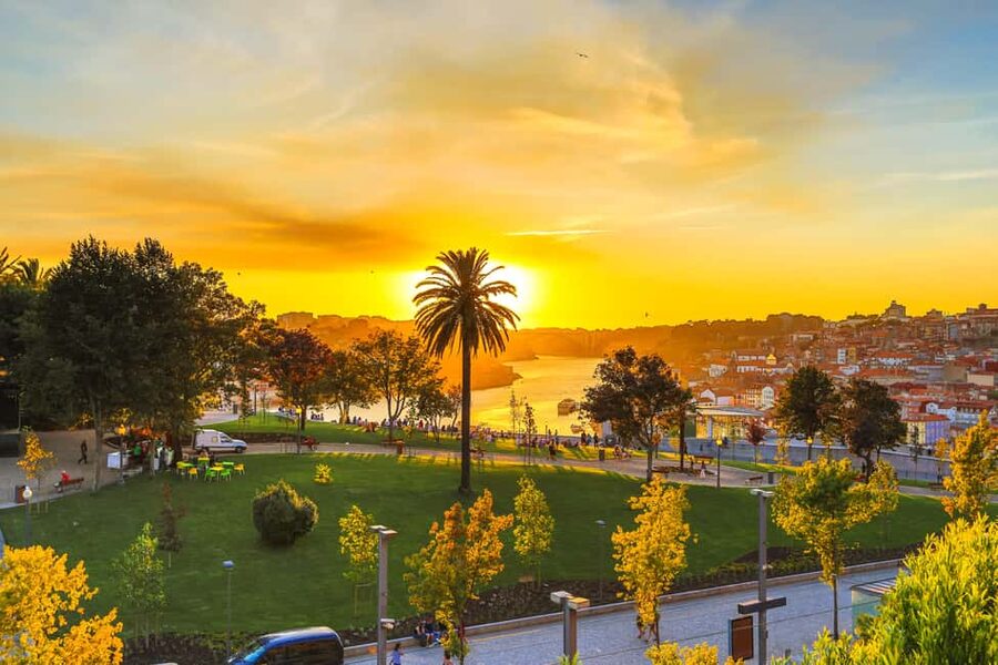 Porto: Sunset Walking Tour with Port Wine and Views - Clérigos Tower and the Carmo/Carmelitas church story stops