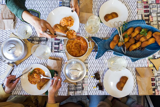 Porto Wine & Dine: Port Wine Cave Food Tour with Eating Europe - Rua Cândido dos Reis: Bacalhau and local fish flavors