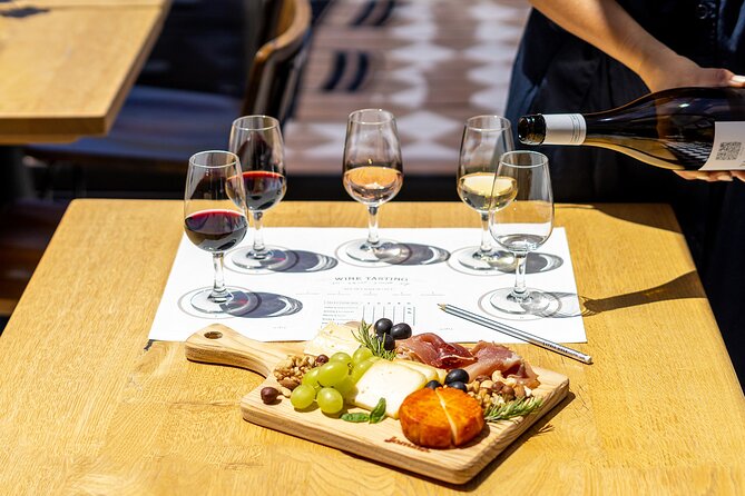 Porto Wine Tasting Experience with Portuguese Tapas Plate - Portuguese Tapas Pairing: Cheese, Cured Ham, Crackers, and Jams