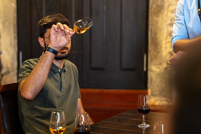 Private 4 Hour Tuk Tuk Tour with Port Wine Cellar Visit & Tasting - São Bento exterior and the old-street weave: Porto’s maze feeling