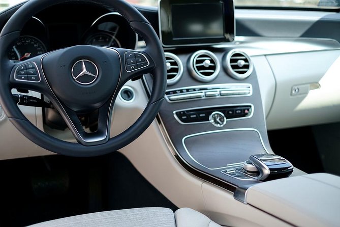 Private Airport Transfer: Porto (24/7 Mercedes VIP Service) - Meeting your driver in Porto arrivals with a nameplate
