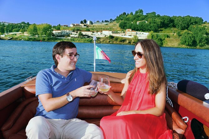 Private Boat Tour - Ricky's Douro - Moving toward Cais de Gaia: wineries, river signs, and centuries of trade