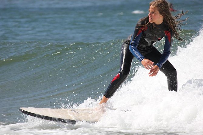 Self-guided tour Bike + Surf - Foz do Douro: Passeio Alegre gardens and the beach bands