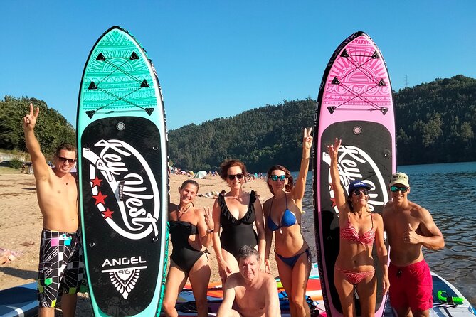 Stand Up Paddle discovering desert beaches of Douro River - Pick Up included - Floating along the Douro River with the guide handling the route