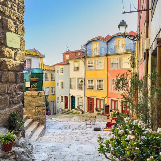 The Soul of Porto: Walking Tour with Food and Wine Tasting - Starting at Largo Primeiro de Dezembro and warming up at Batalha Square