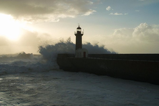 The Sunset Porto Bike Tour - Foz do Douro stops: gardens, fortress walls, and lighthouse views