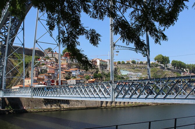 Wine Tasting with Tapas Walking Tour in Porto - Stop 2: Ribeira on Foot, Short and Useful